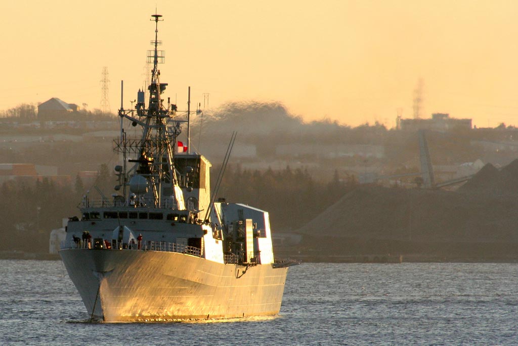 Early morning in the Bedford Basin, HMCS Fredericton readies to haul anchor. (<a href="http://www.flickr.com/photos/m_b_t/">Photo source</a>)