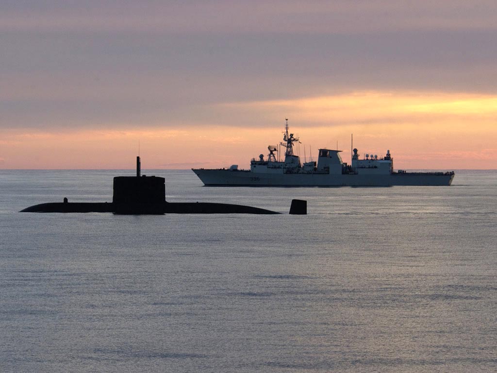 HMCS MONTREAL with HMCS WINDSOR (SSK) in the foreground.